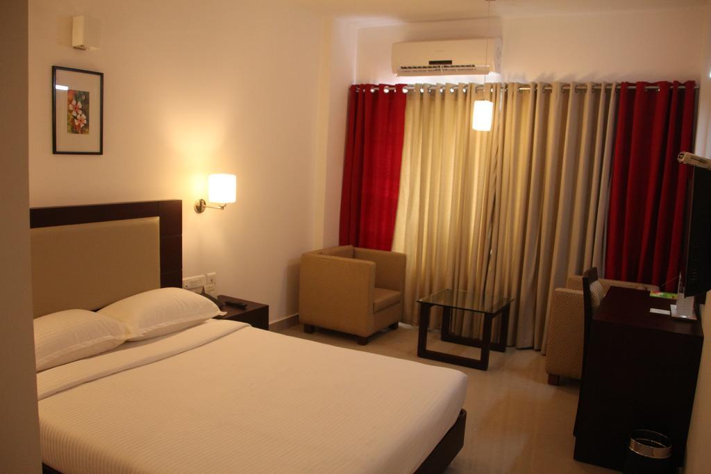 Hotel Hills Park Pathanamthitta Номер фото