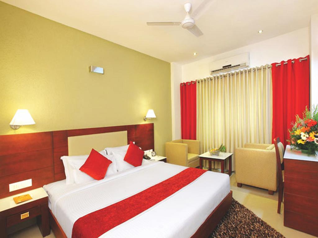 Hotel Hills Park Pathanamthitta Номер фото